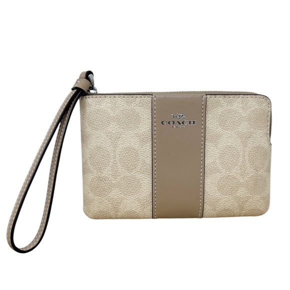 Coach New Corner Zip Wristlet
In Signature Canvas With Stripe - Picture 2 of 11